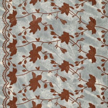 Geborduurde bloemenstof waxed denim